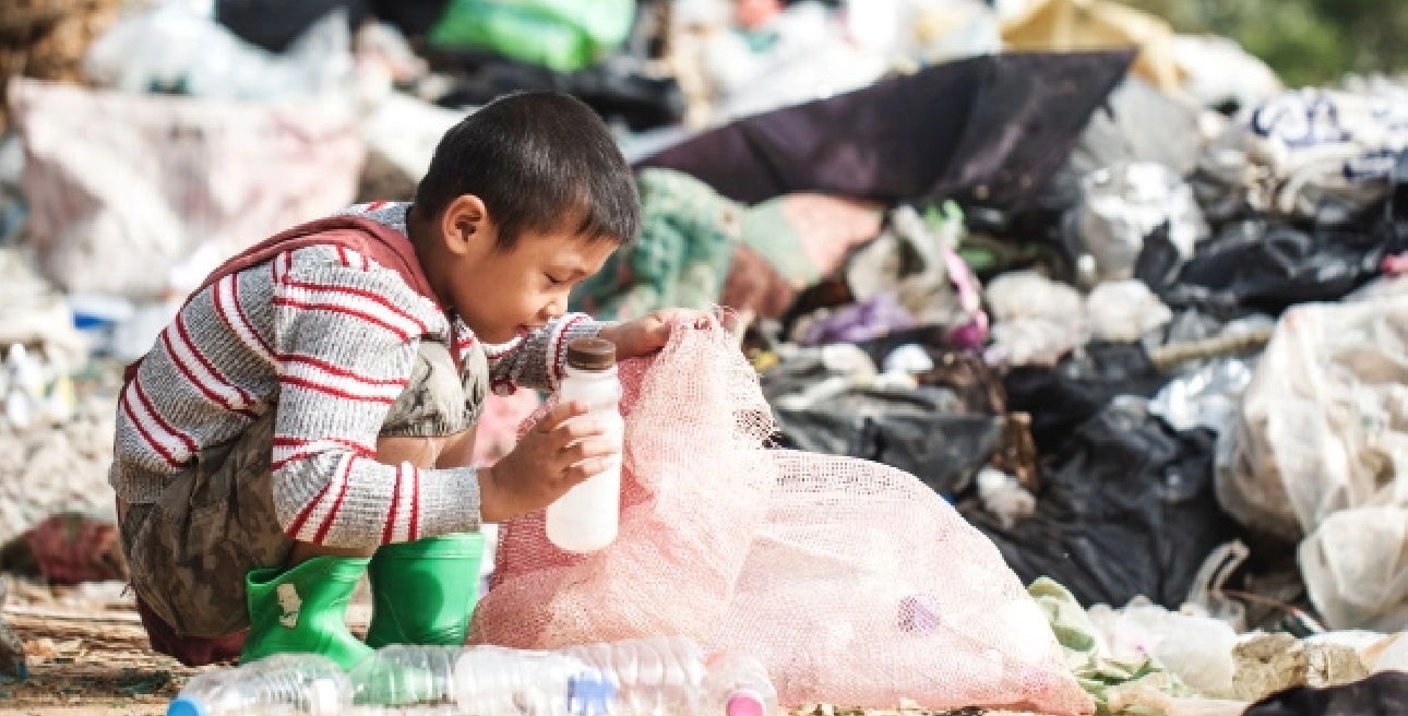 Child in garbage dump
